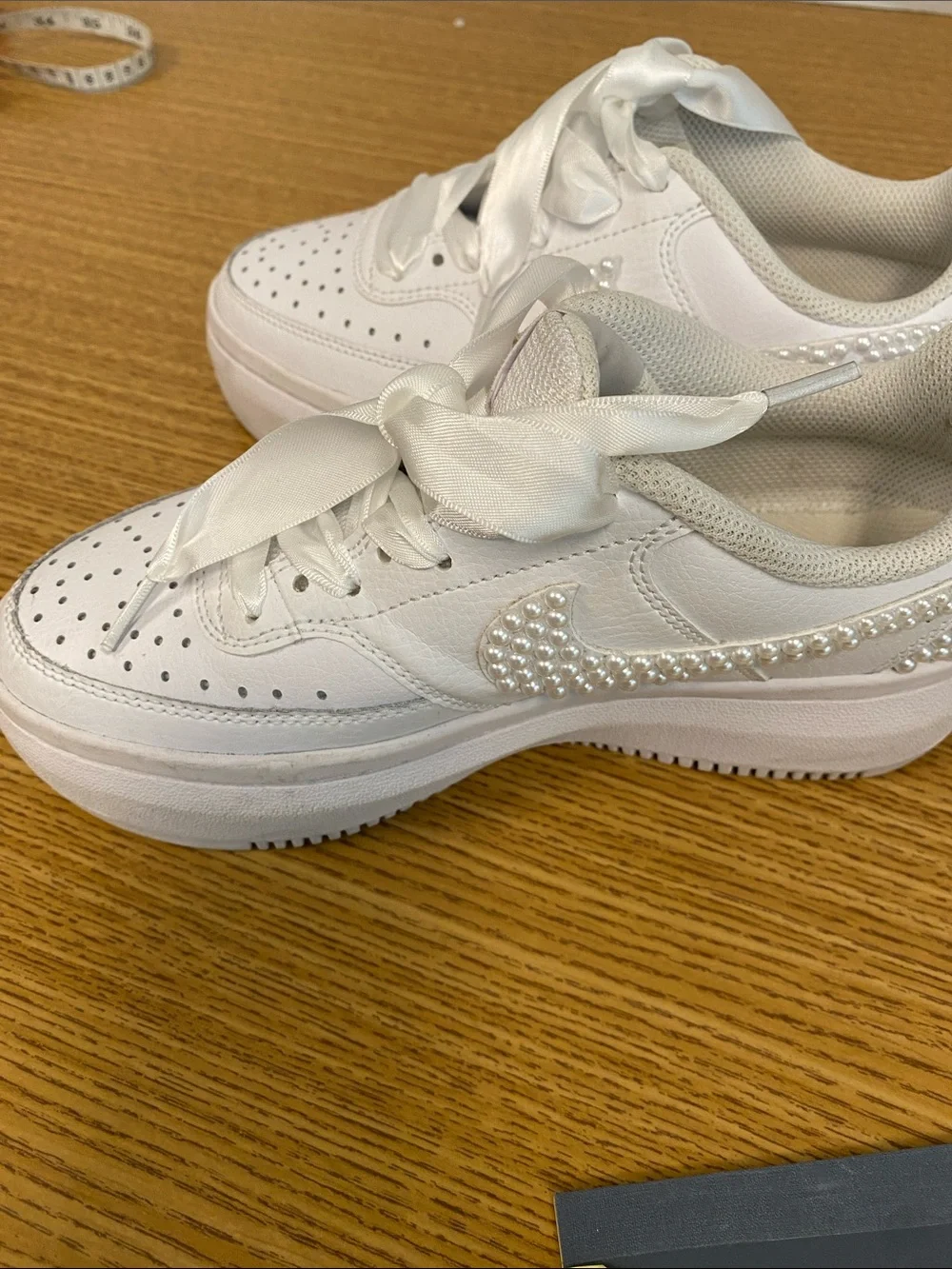 Nike White Platform Sneakers with Pearl Swoosh